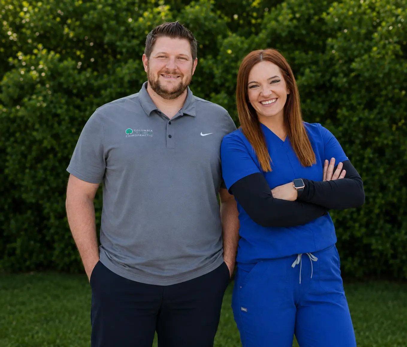 Doctors smling with green background